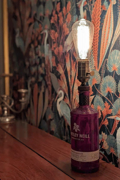 Close up of bottle repurposed as light