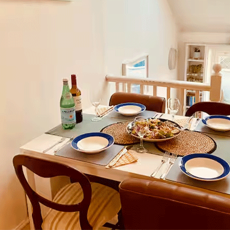Kitchen table laid out in rental.